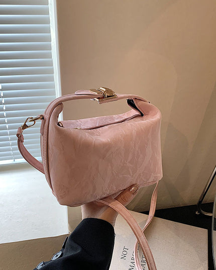 High-end handbag with a small square shape