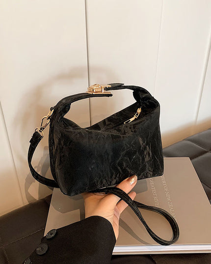 High-end handbag with a small square shape