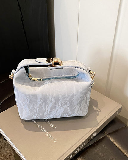 High-end handbag with a small square shape
